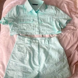 Teal short set two piece .